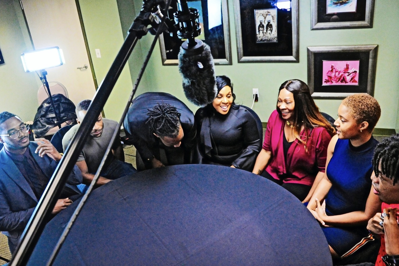 The TO BE US Productions team behind the scenes on a film set